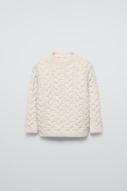 CABLE-KNIT SWEATER